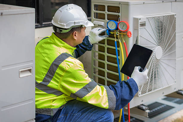 Professional Hvac Installation technician working in Vallonia, IN